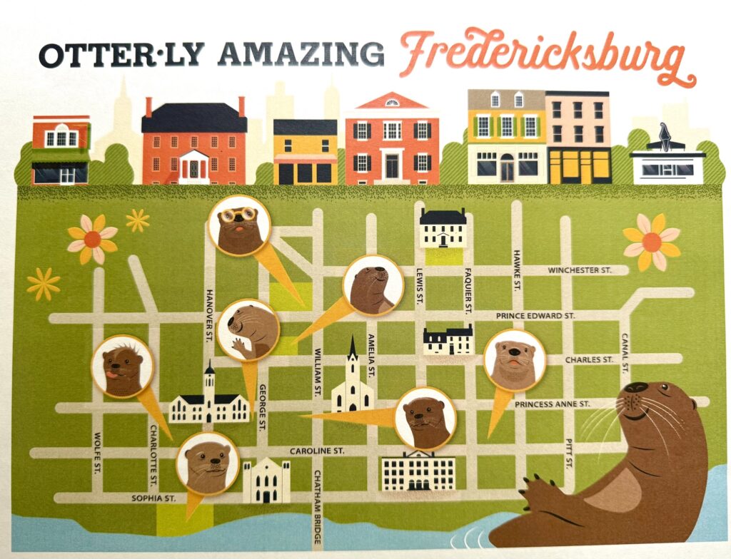 Illustrated map of Fredericksburg with cartoon otters marking various points of interest along city streets, highlighting fun things to do in Fredericksburg with kids, under the title "Otterly Amazing Fredericksburg.