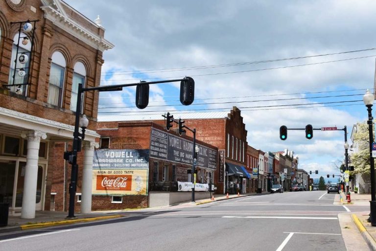 streets with brick buidings and overhead stoplight
