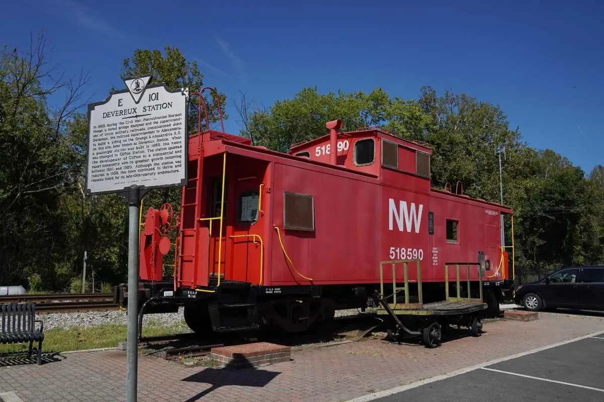 red caboose car at historic train station