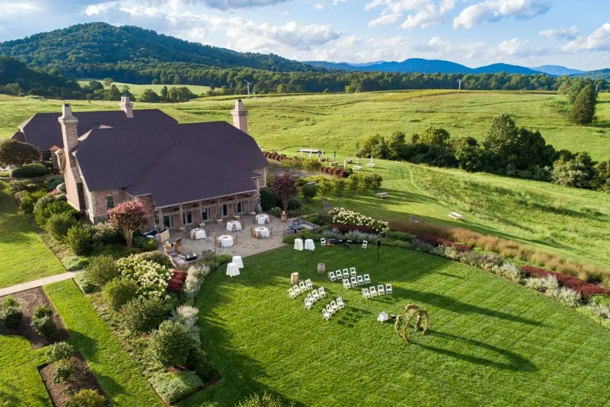 overhead view of mountains and vineyard set up for wedding