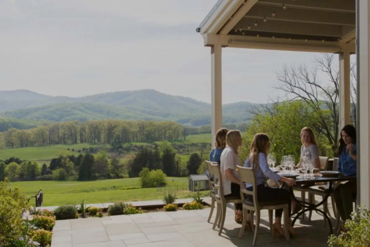 stone covered patio with mountain foothills in distance