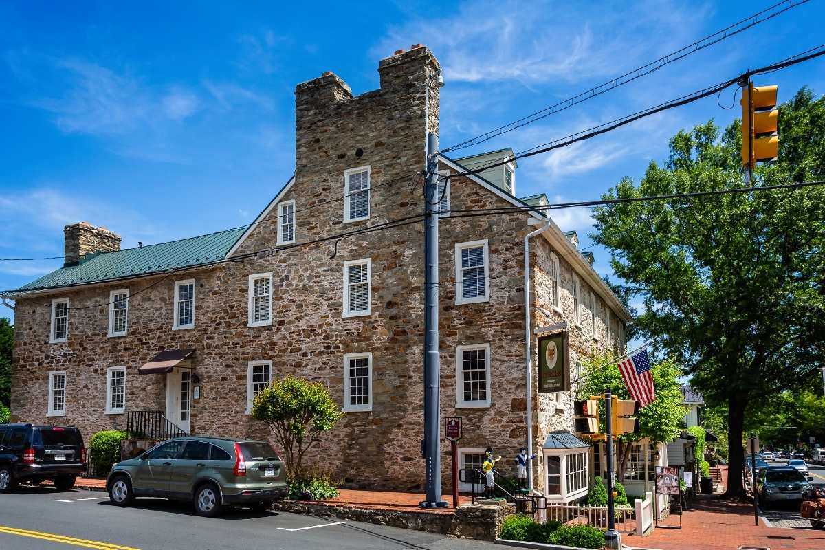 colonial stone building on charming city street