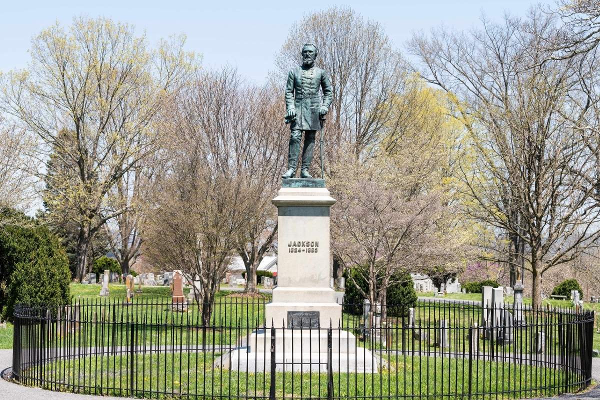 statue of stonewall jackson surrounded by iron fence