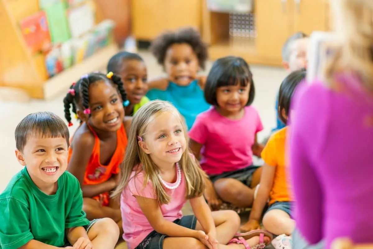 small children listening to story at library