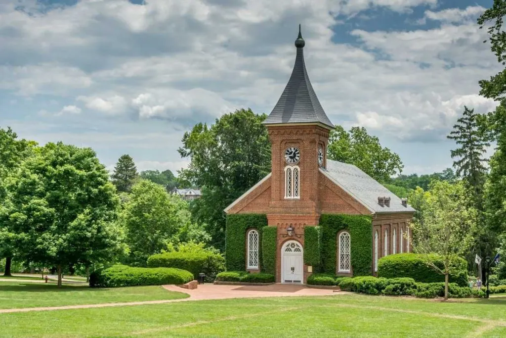 brick historic church covered in ivy