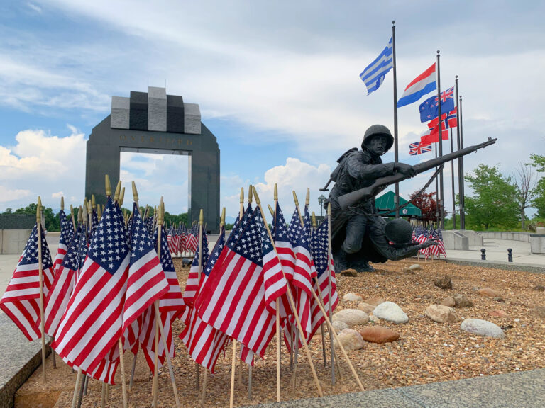 statue and American flags displayed at National D Day museum in Bedford VA