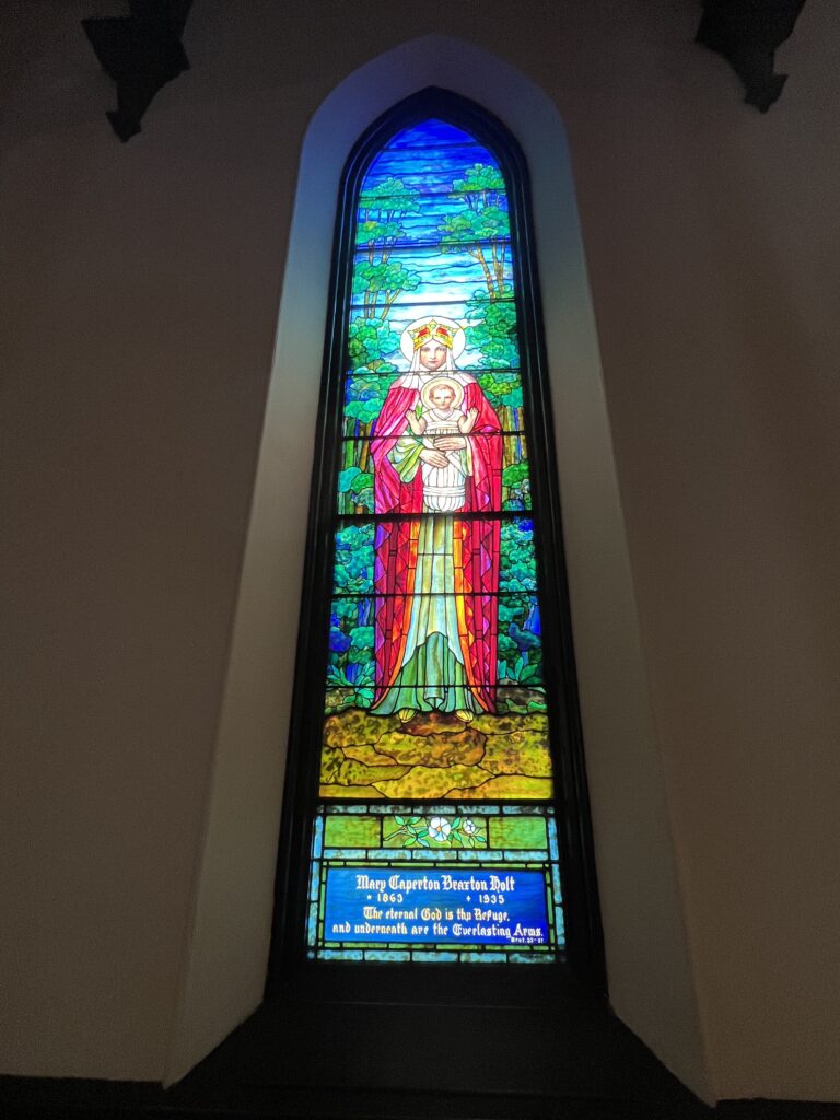 A church in Staunton featuring a stained glass window.