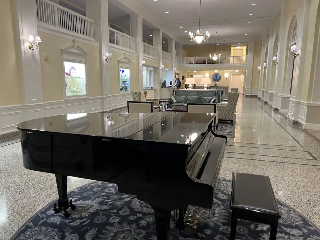 A black piano in the lobby of Hotel 24 South.