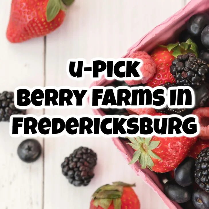 A carton of assorted fresh berries on a white table with text overlay: 